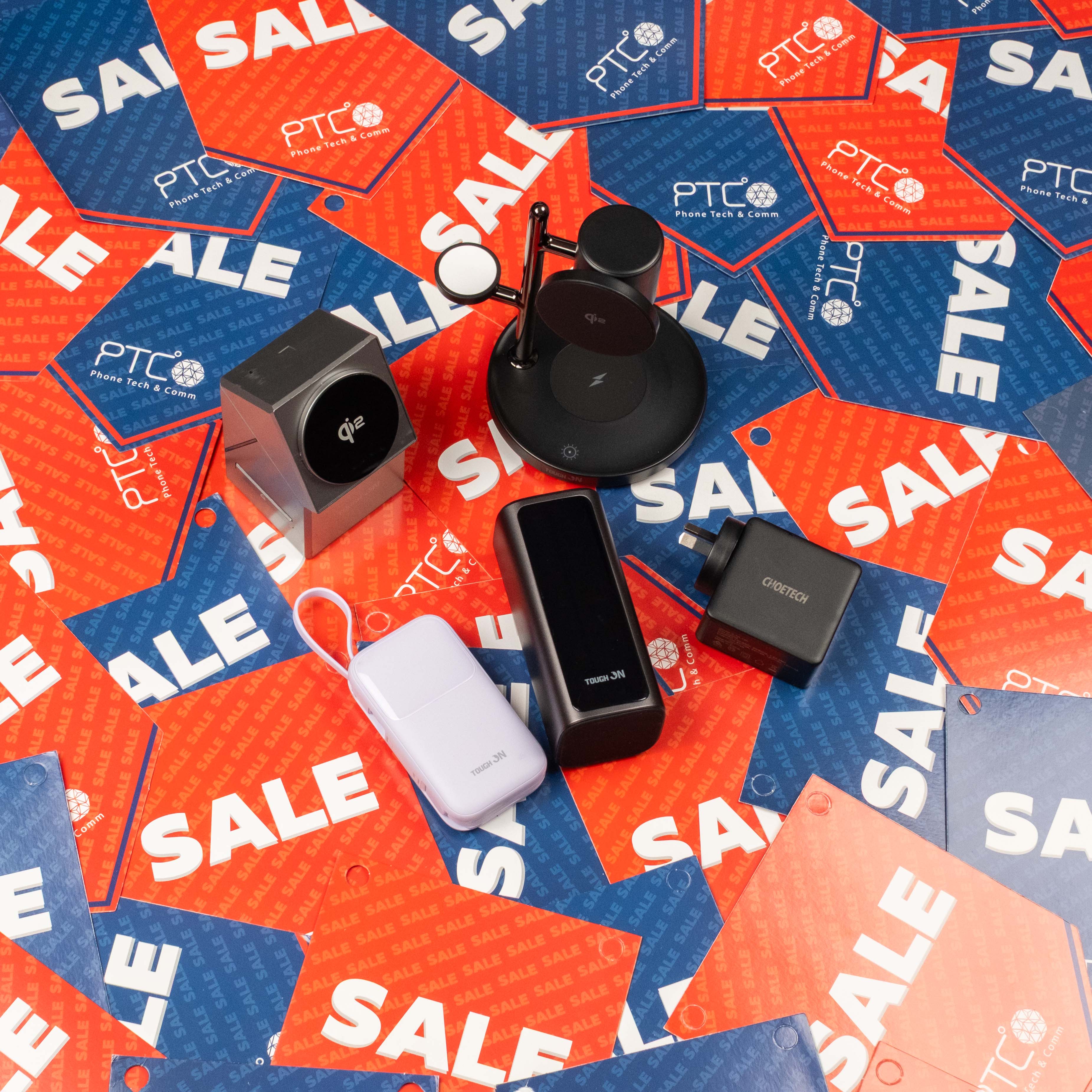 power banks and wireless charger sitting on sale background