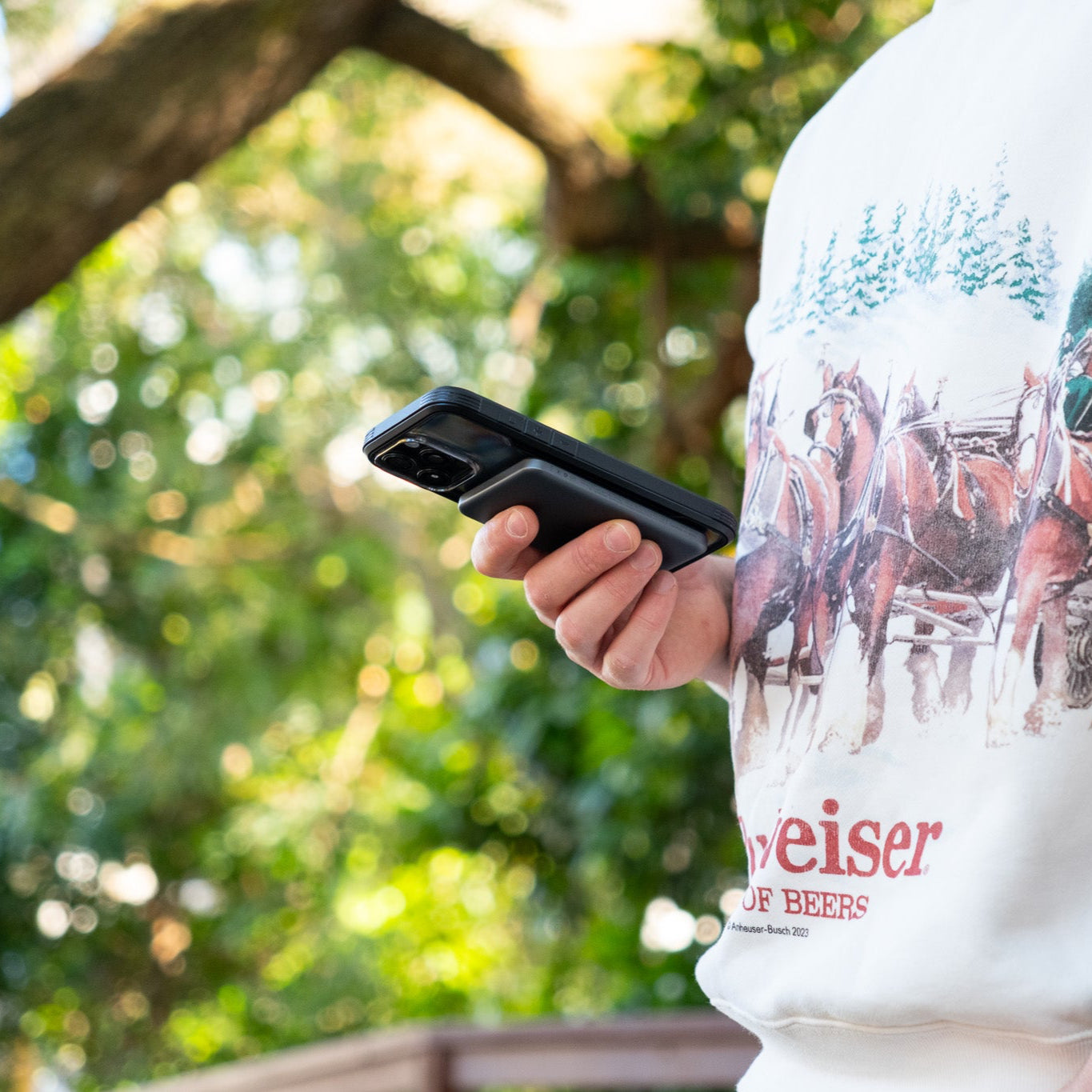 Ultra slim power bank in a persons hand