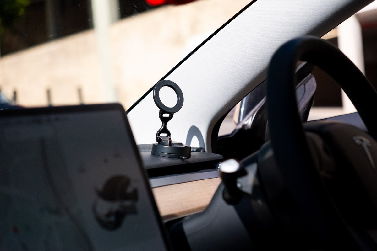 Driver view of the Tough On MagFlex car mount with phone attached