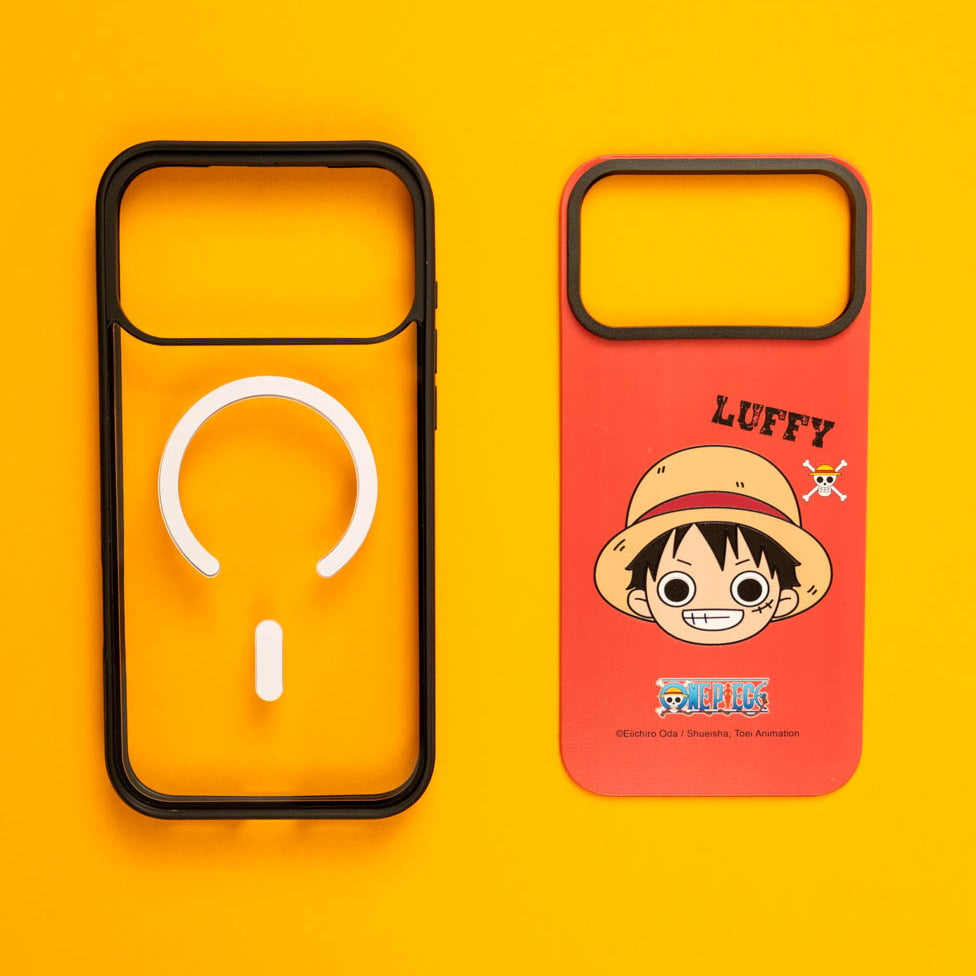 Clear MagSafe case next to a One Piece Luffy printed skin